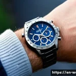 크로노그래프 기능과 사용법 - A close-up, hyper-realistic image of a modern chronograph wristwatch on a male wrist, focusing on th...